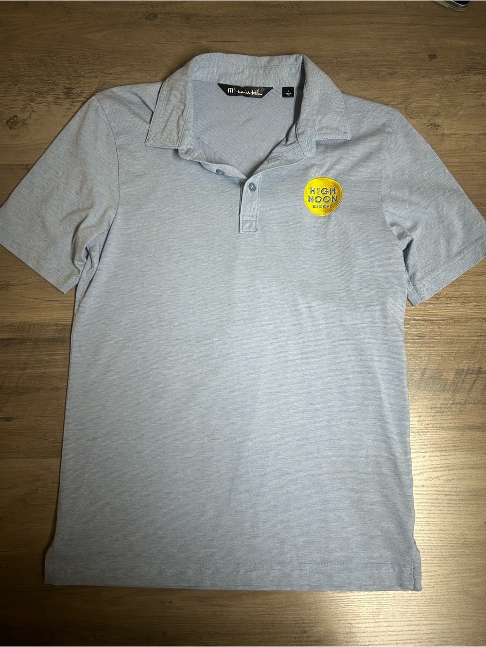 Travis Mathew Heather Light Blue Polo with Yellow Patch